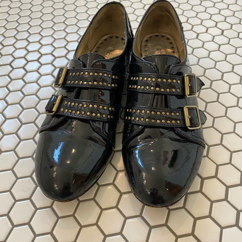 Libby Edelman studded black and gold loafer